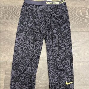 women nike pro black & grey leopard capris